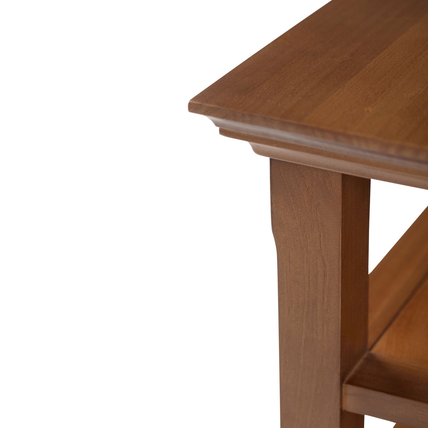 Close-up of the top corner of the Acadian - Handcrafted End Table, highlighting its smooth wooden finish, tabletop, leg, and lower shelf.
