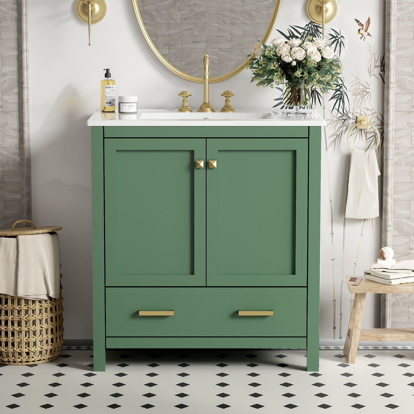 A Bathroom Vanity With Single Sink, combo cabinet, 2 doors, and a drawer with soft-closing is topped with a white countertop and gold handles. It sits in front of a round mirror on black-and-white tile flooring, with accessories placed on top.