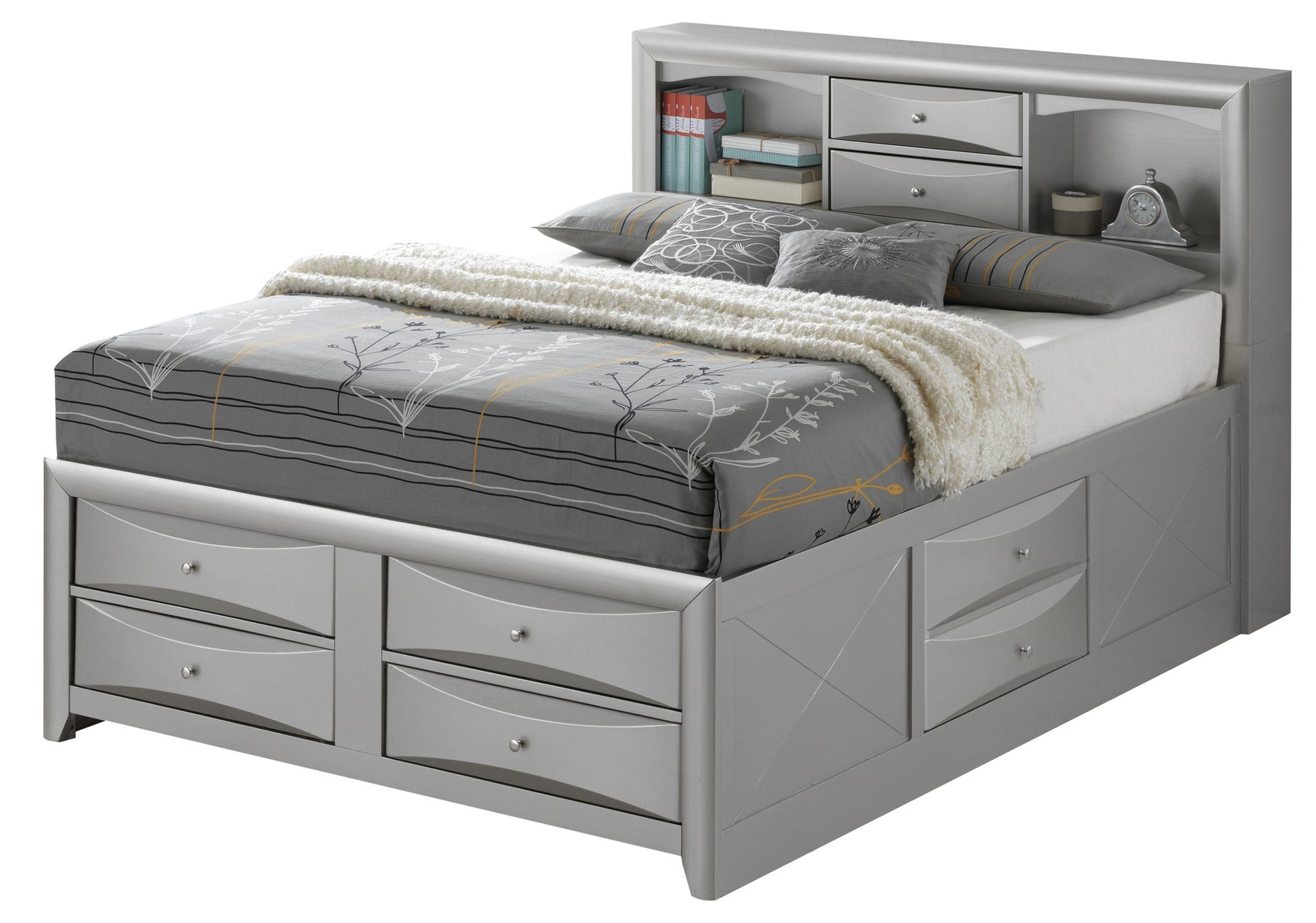 The Marilla Storage Bed With Bookcase Headboard features a modern grey design, multiple drawers for storage, shelves in the headboard for books and decor, and comes neatly made with gray bedding and decorative pillows.