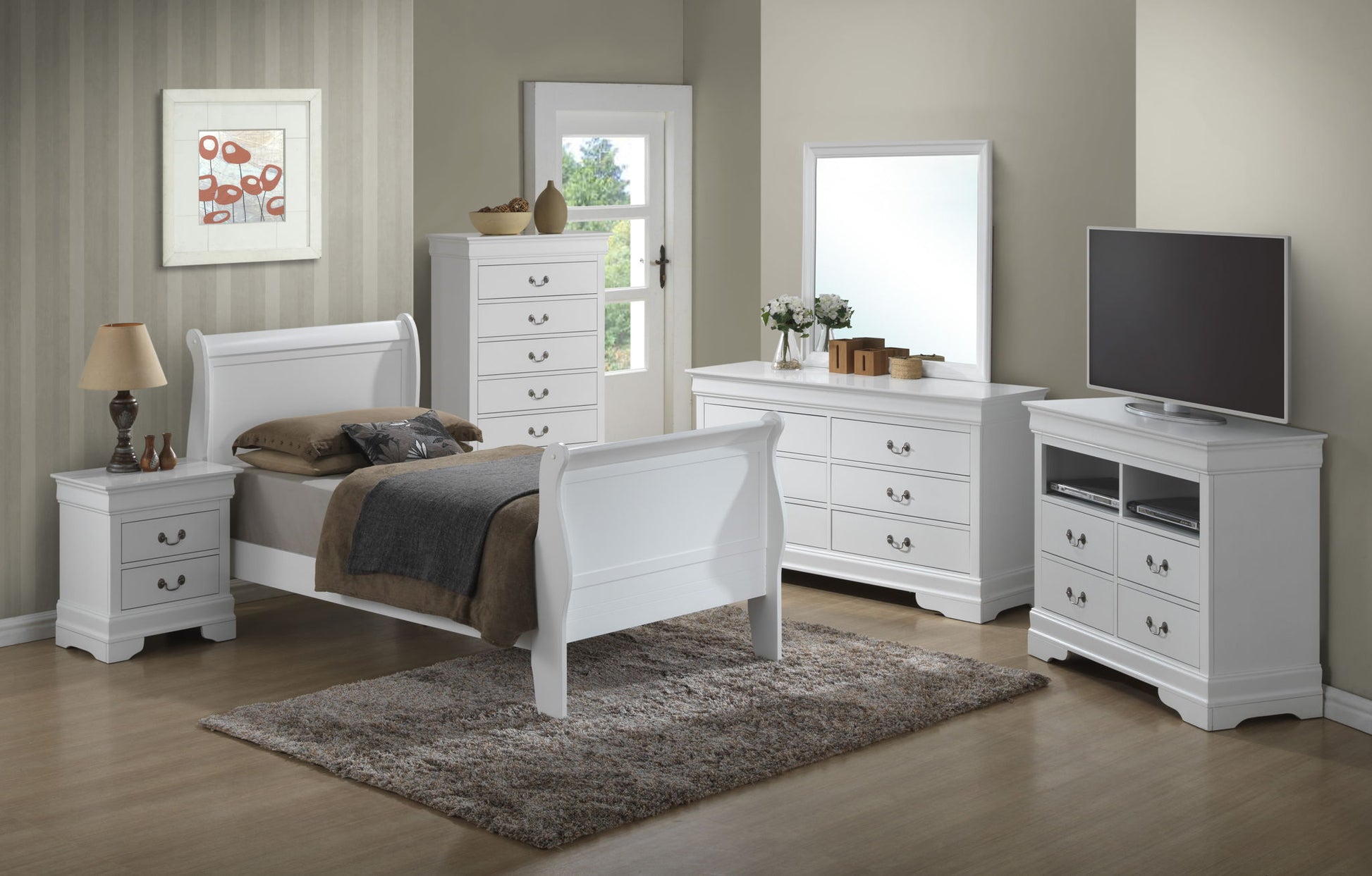 A modern bedroom features the Panel Sleigh Bed with white furniture, including a nightstand, dresser with mirror, TV stand, and beige rug on wooden flooring. A lamp, framed art, decor items, and sunlight from a window complete the scene.