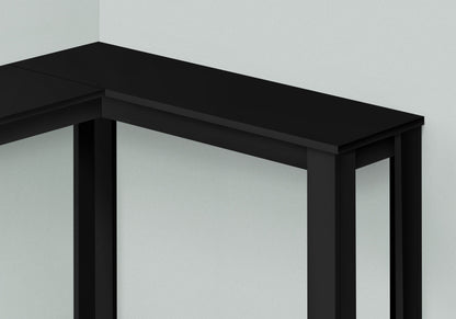 The Corner Accent Console Table For Entryway, featuring a unique modern design, stands in the corner of a light gray room.