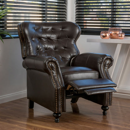 The Contemporary Style Push Back Recliner with button tufted stitching and nailhead trim, shown in a modern room with wood flooring, large windows, a white table, and decorative accents.