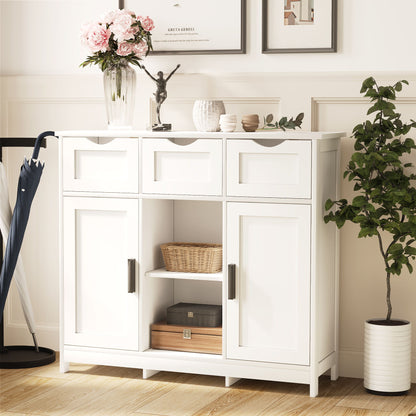 The Storage Cabinets Wooden Floor Cabinet features drawers and shelves, topped with a glass vase of pink flowers, a statue, and cups. Positioned by a plant and a coat rack with an umbrella, it's an ideal accent cabinet for your living room or bedroom decor.