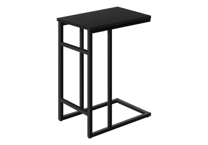 The Accent Table is a contemporary, C-shaped black metal table with a rectangular top and open frame, designed to slide under sofas or chairs for versatile use.