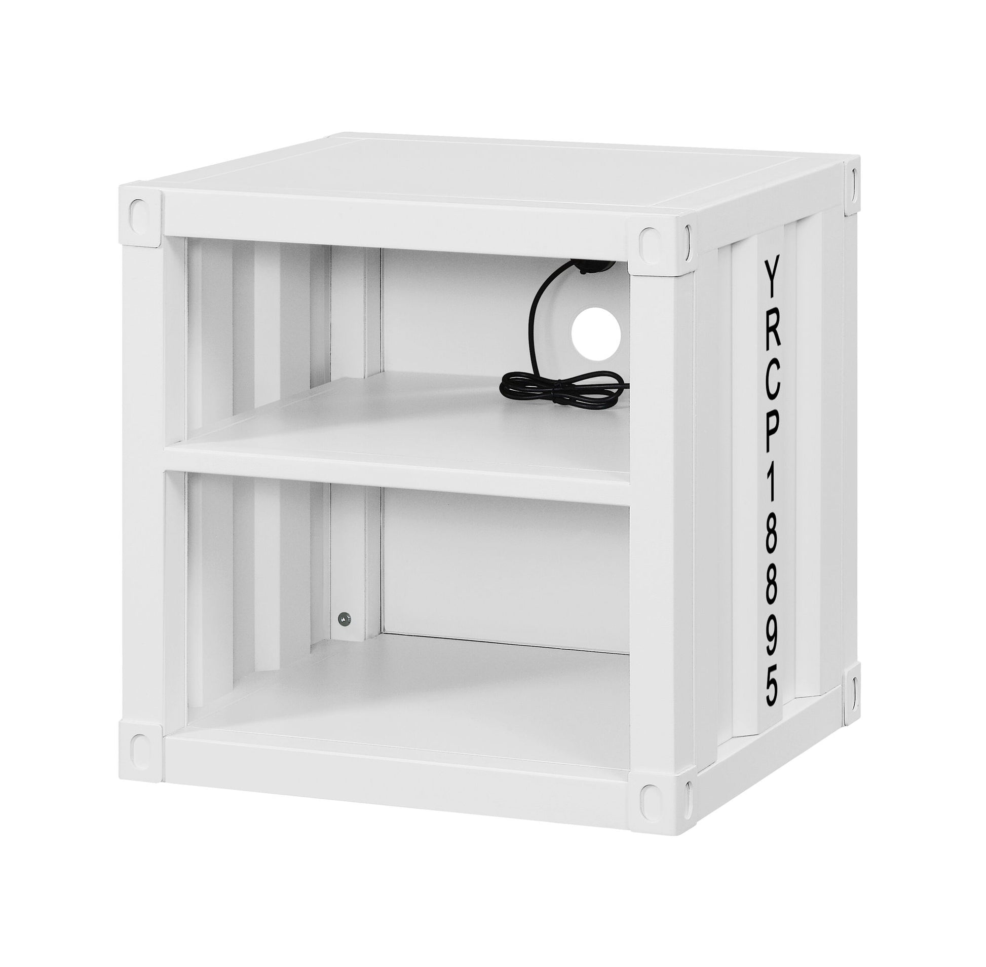 The Cargo - Nightstand With USB is a white, box-shaped unit with two open shelves, a back panel hole for cables, and "YRCP18895" printed vertically on the right side. A black cord is coiled inside the middle shelf.
