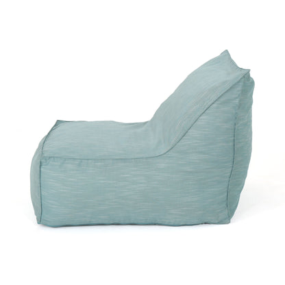 The Ettie Water Resistant Fabric Bean Bag Chair is shown from the side against a white background, featuring a light blue fabric and a slightly reclined backrest.