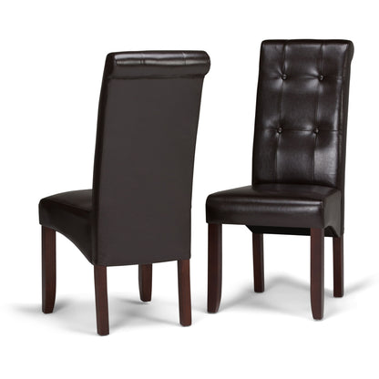 The Cosmopolitan Deluxe Tufted Parson Upholstered Chair set includes two dark brown faux leather dining chairs with high tufted backs and wooden legs, displayed from multiple angles against a white background.