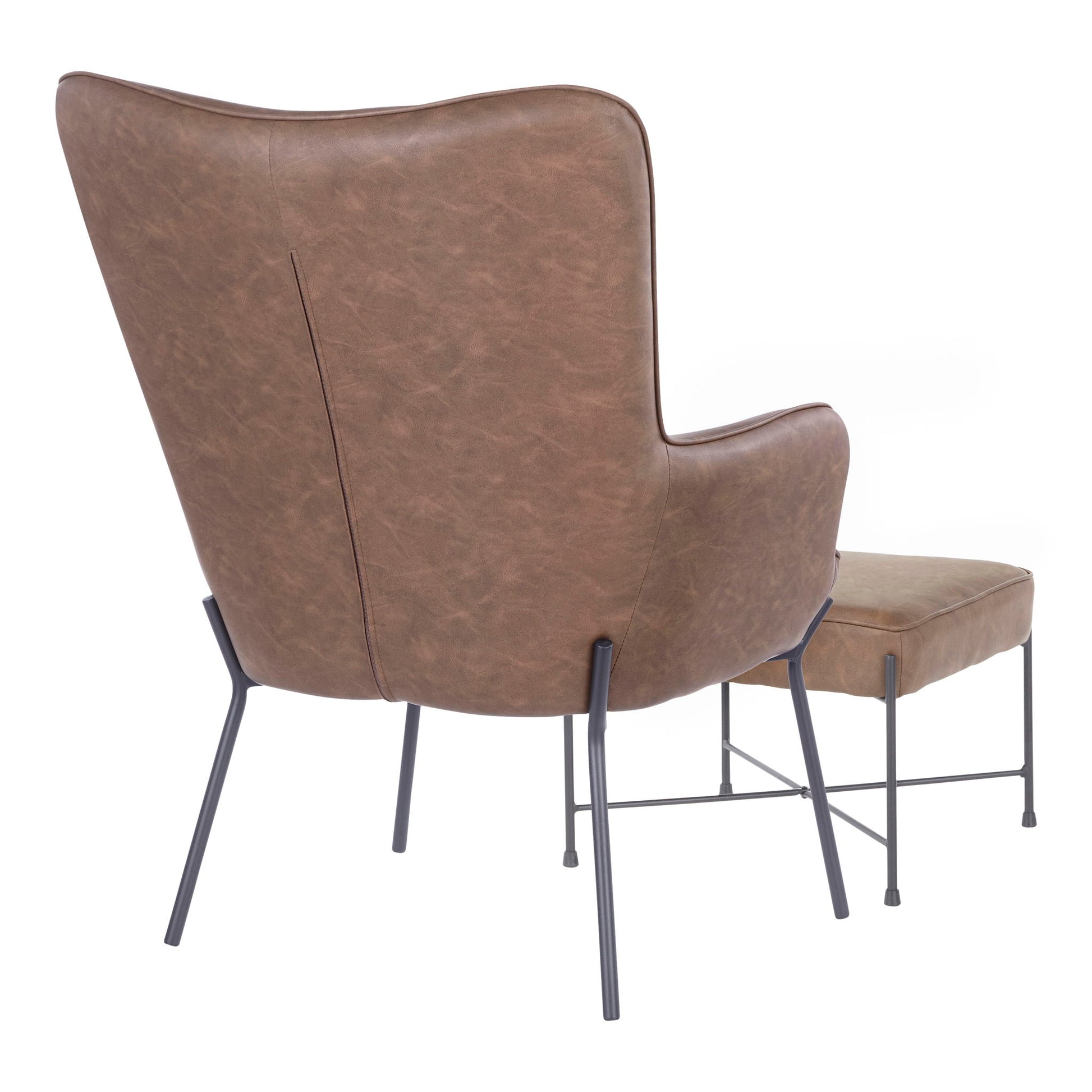 The Izzy Industrial Lounge Chair & Ottoman Set features a brown leather armchair with slender black metal legs, shown from the back, paired with a matching ottoman on similar legs, both set against a white background.