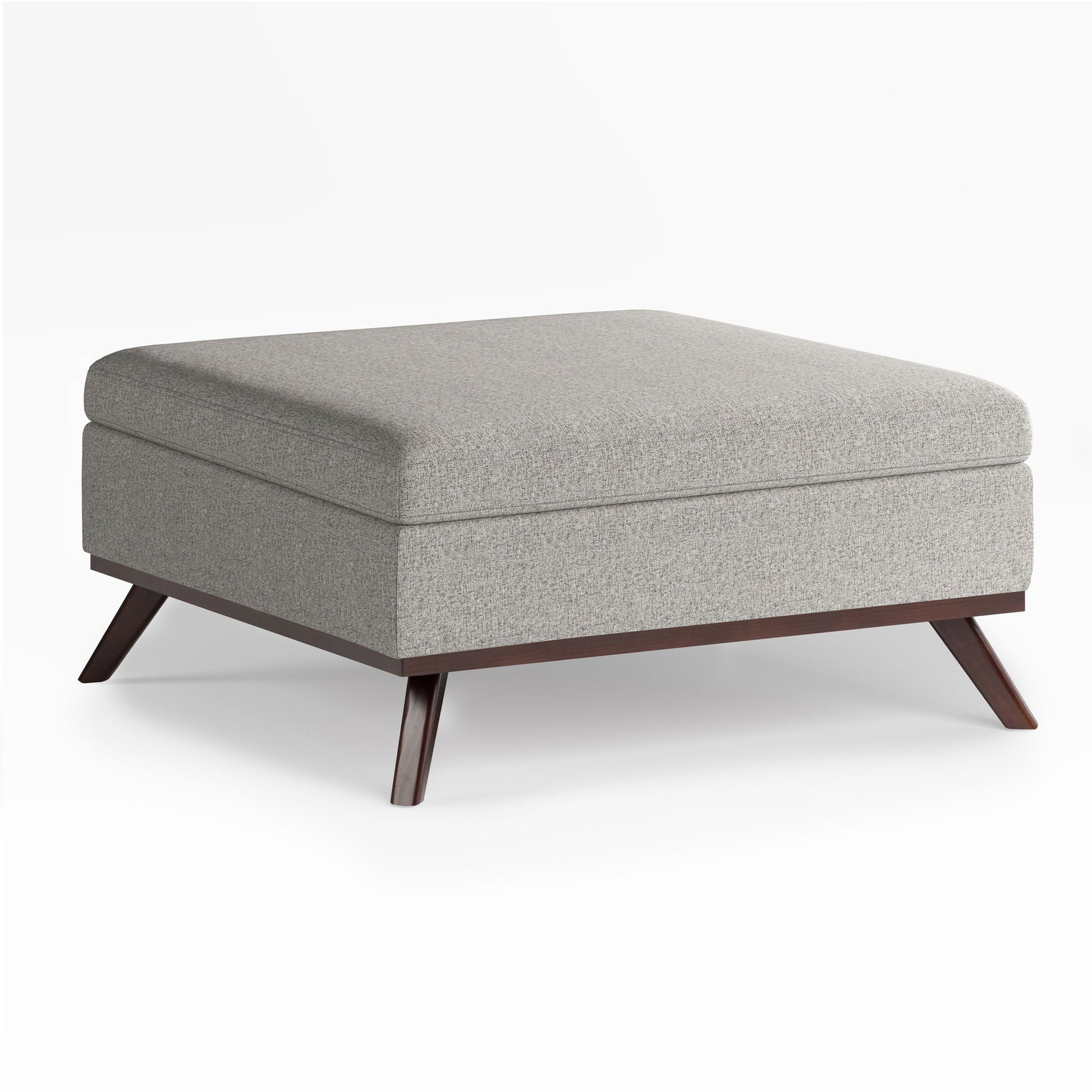 The Owen Multifunctional Square Coffee Table Storage Ottoman features a light gray upholstered, cushioned top and angled dark wood legs, shown against a white background.