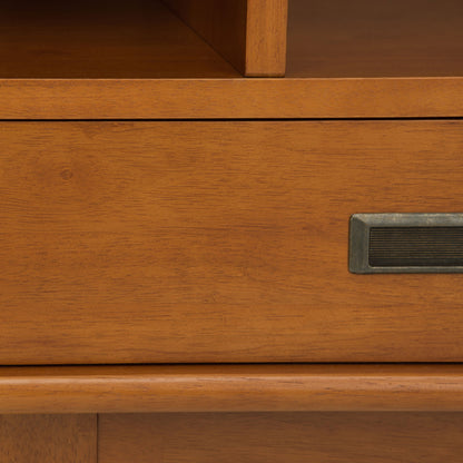 Close-up of the Draper - Mid Century Wide Bookcase And Storage Unit, highlighting its smooth wood texture, warm brown finish, and rectangular brass handle.