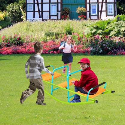 Three children enjoy the Xss008 High Quality Kids Seesaw Playground Equipment in a garden. One girl runs, a boy sits on the green/blue plastic rocker, and another child stands nearby amid flowers and a house in the background. For ages 3+.
