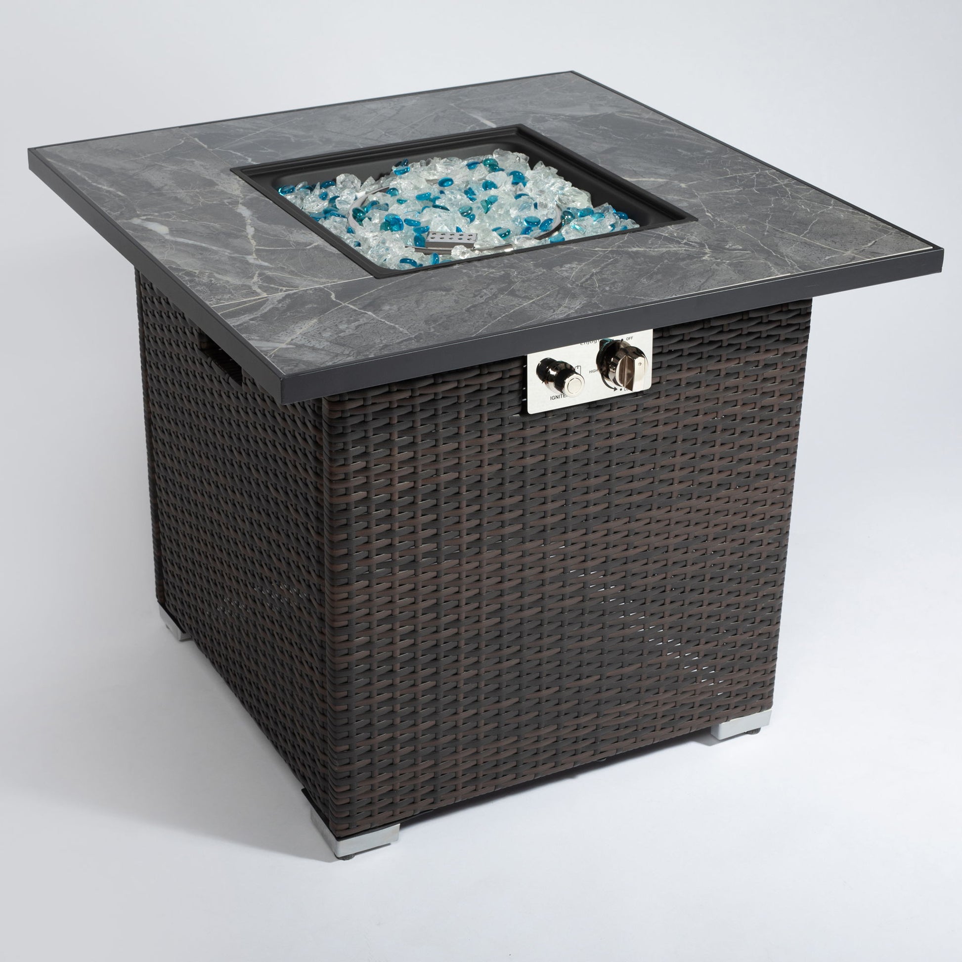 The 30" Espresso Outdoor Fire Table features a propane gas fire pit with lid, glass rocks in the center, rain cover, and a visible control panel on one side. It has a square design with a dark base and gray stone top.
