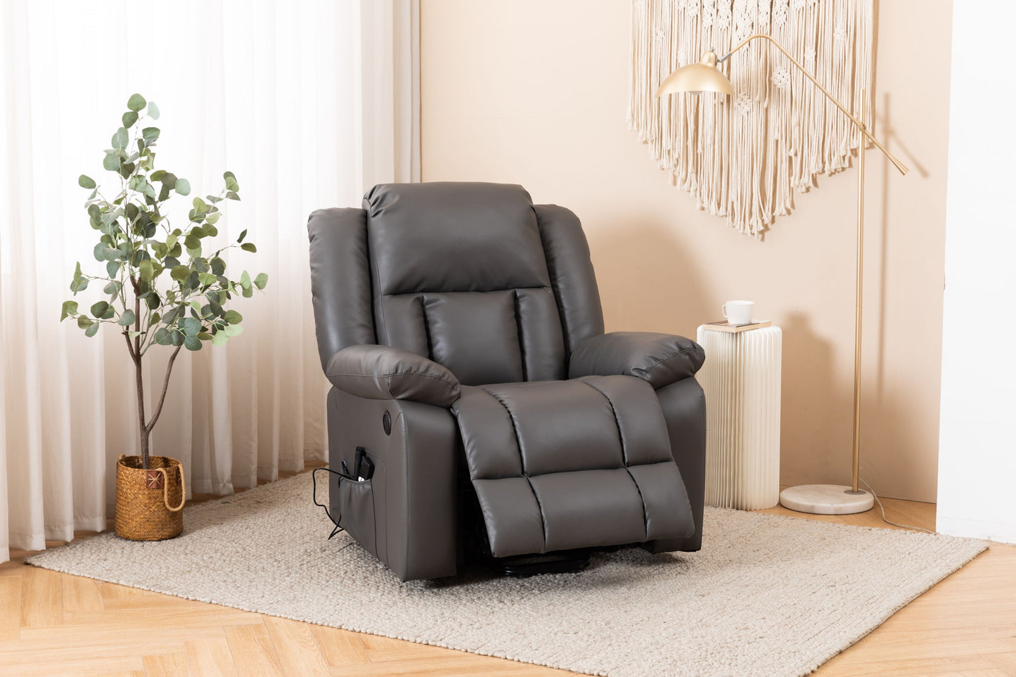 An Electric Power Massage Recliner Chair in dark gray sits on a light rug in a cozy living room with a potted plant, modern floor lamp, and cup on a small white side table near cream-colored curtains.