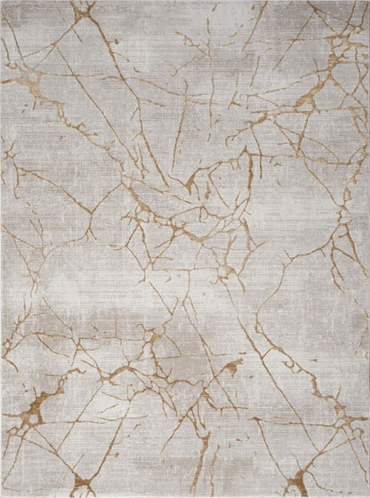 The Elegance - GC_CNC6004 Area Rug features a rectangular shape with a light beige background and an abstract marble-like pattern of thin gold and brown lines.