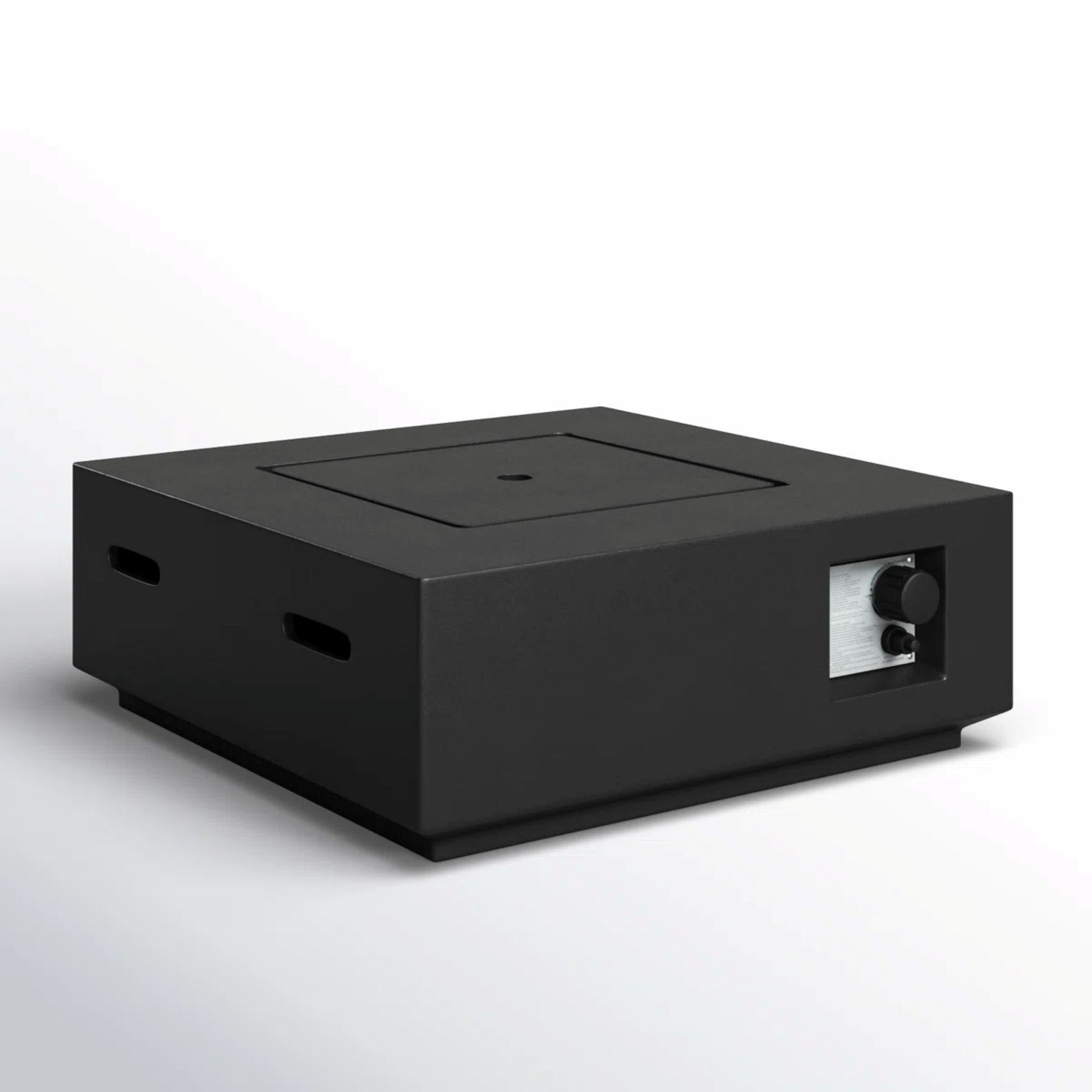 The Reinforced Propane / Gas Fire Pit Table is a black, rectangular unit with a minimalist design, featuring a metallic control panel with two knobs and a display. It is shown on a light surface against a white background.