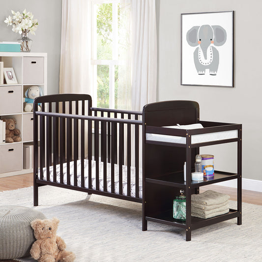 The Ramsey - 3-in-1 Convertible Crib / Changer Combo stands in a bright nursery with a window, toy-filled shelves, a teddy bear on the floor, and an elephant picture on the wall.