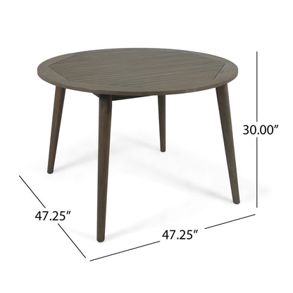 The Stamford - Outdoor Dining Table Modern Design features a round wooden top with four angled legs, measuring 30 inches in height and 47.25 inches in diameter, as shown by the measurement labels.