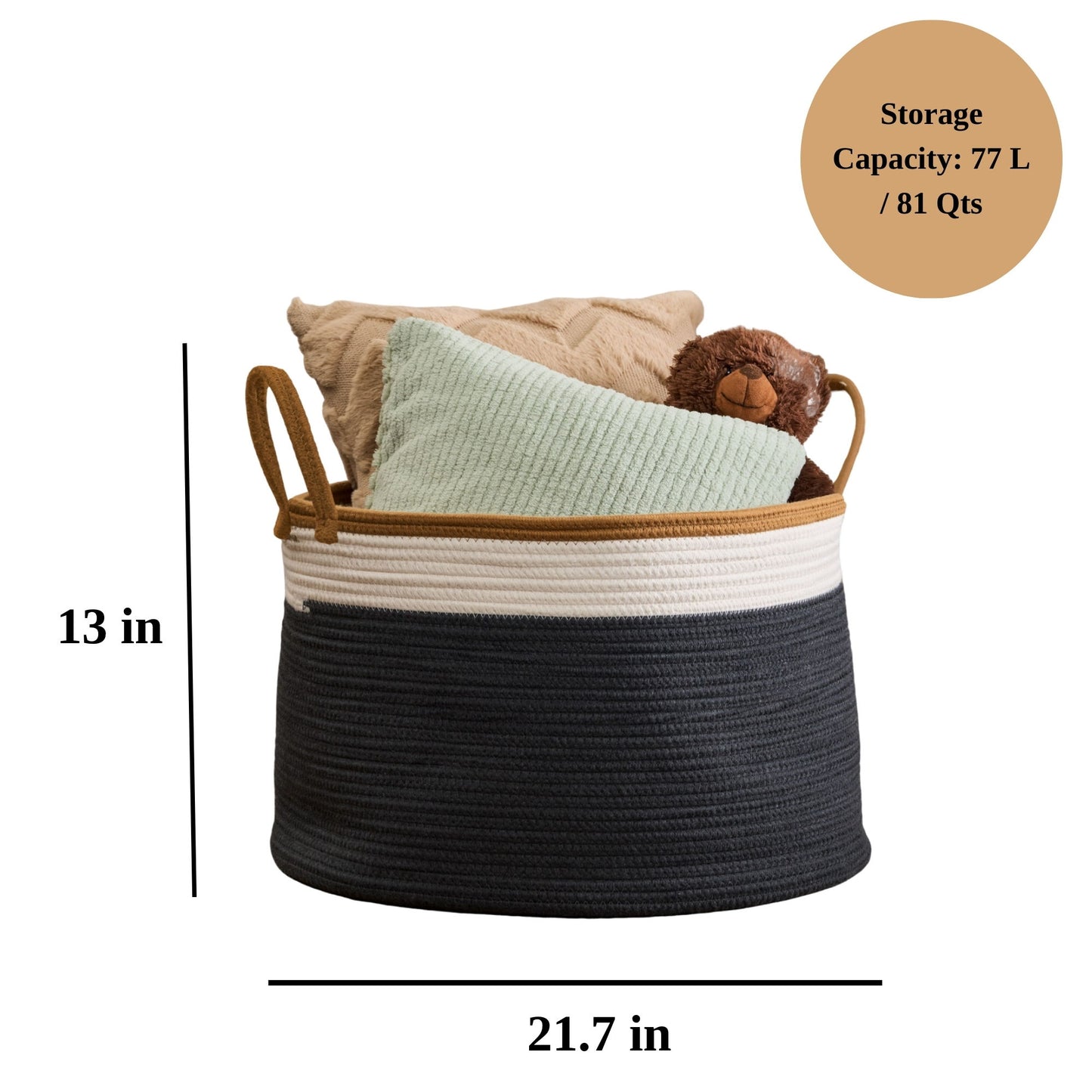 The Francis - Cotton Round Laundry And Storage Basket, in black and white with handles, is shown holding two pillows and a brown stuffed bear. It measures 13" high by 21.7" wide and has a 77-liter (81-quart) capacity.