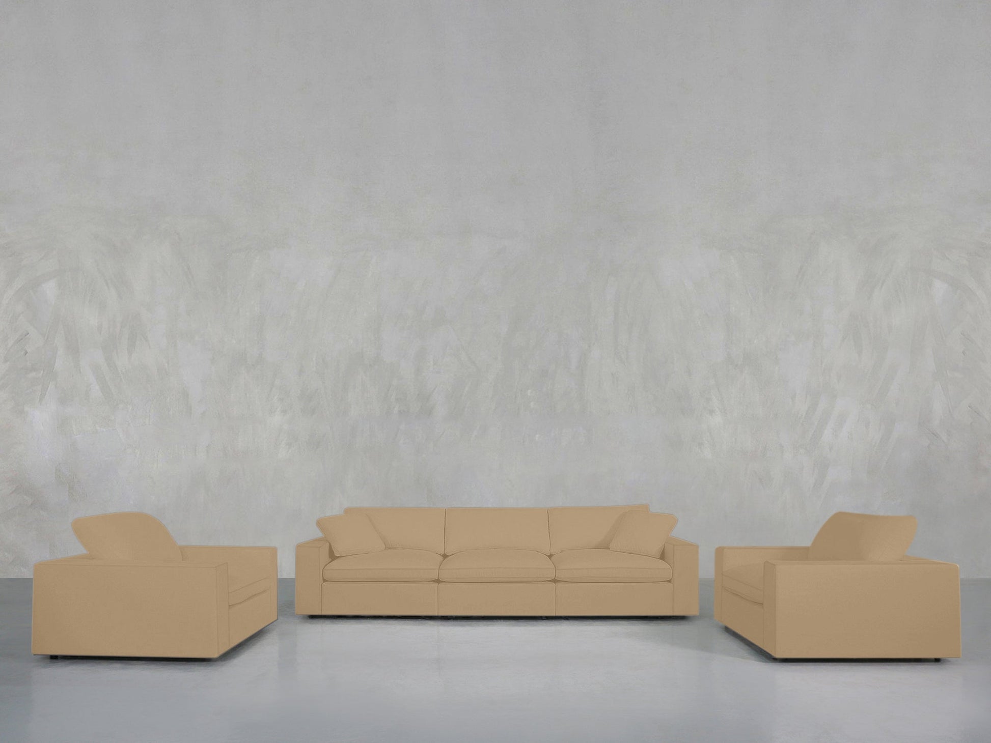 The 3-1-1 Sofa & Armchair Set, featuring a beige sofa and two matching armchairs, is arranged against a light gray textured wall on a smooth light gray floor for a modern living room look.