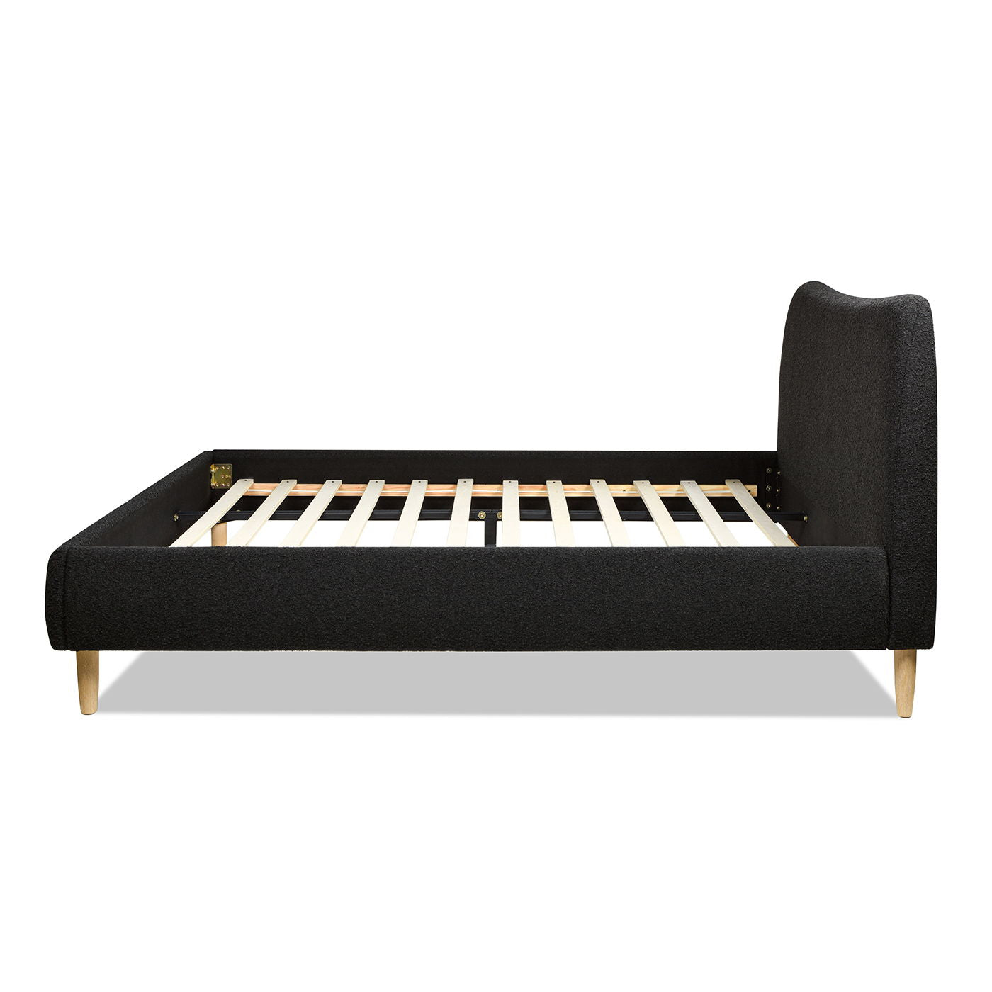 Side view of the Roman - Curved Headboard Upholstered Platform Bed featuring black upholstery, light wooden legs, an arched headboard, and wooden slats for mattress support. Mattress not included.