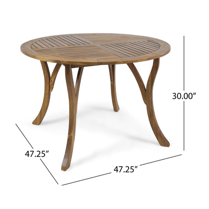 The Hermosa Outdoor Acacia Wood Table features a circular slatted top, curved legs, and measures 47.25" in diameter by 30" high.