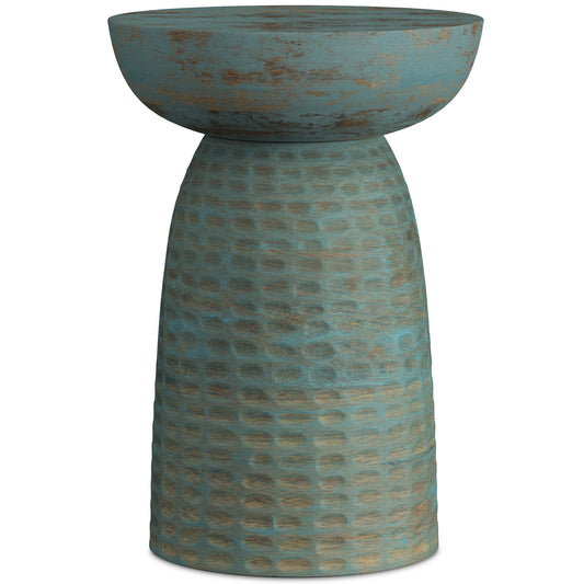 The Boyd - Handcrafted Wooden Accent Table features a tall, blue-green textured pedestal with a wide, shallow bowl top and tapered patterned base, all finished in a rustic, weathered style.