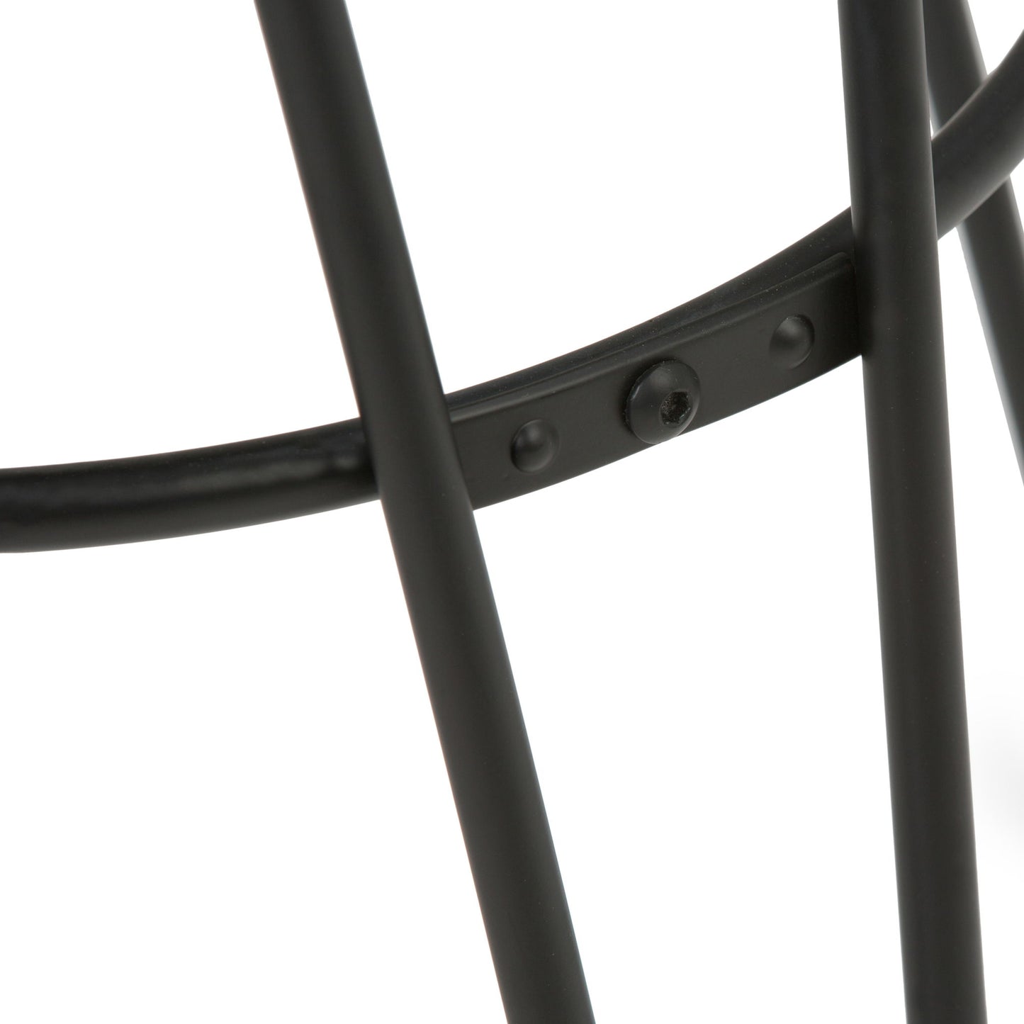 Close-up of intersecting black legs joined by a small bolt on the Simeon Multifunctional Metal Stool With Wood Seat, set against a white background.
