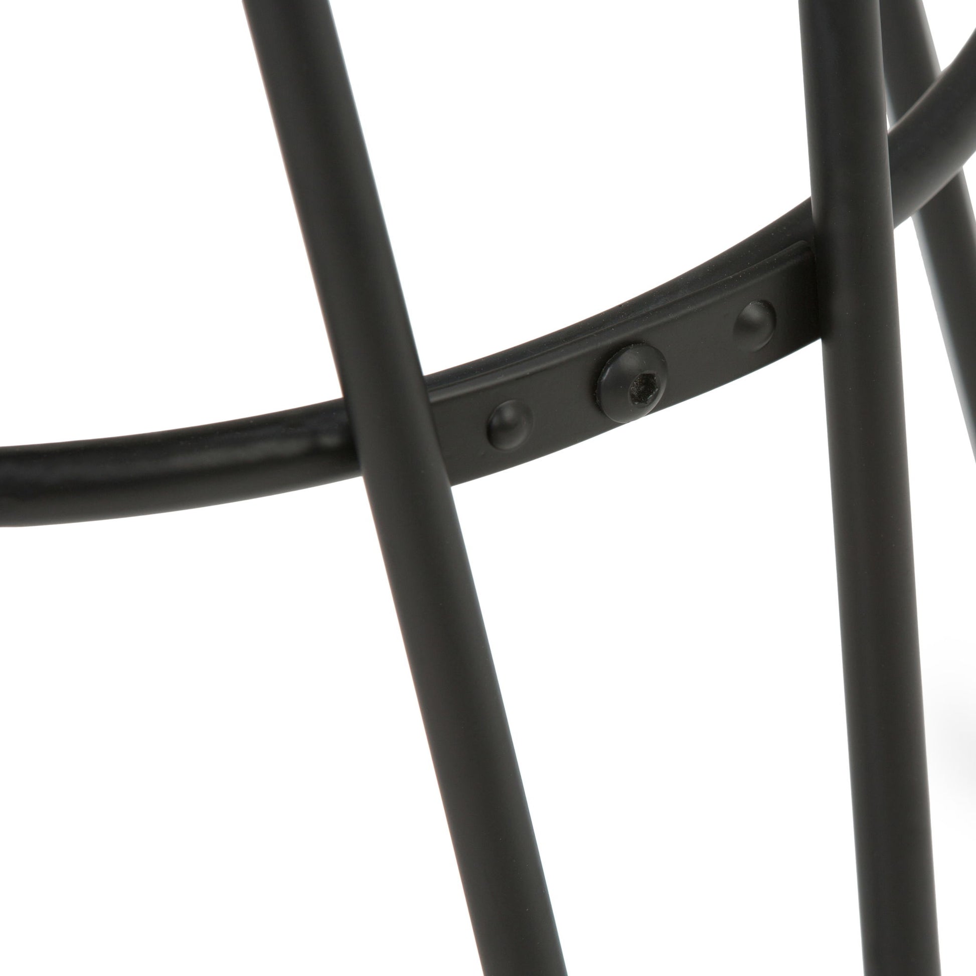 Close-up of intersecting black legs joined by a small bolt on the Simeon Multifunctional Metal Stool With Wood Seat, set against a white background.