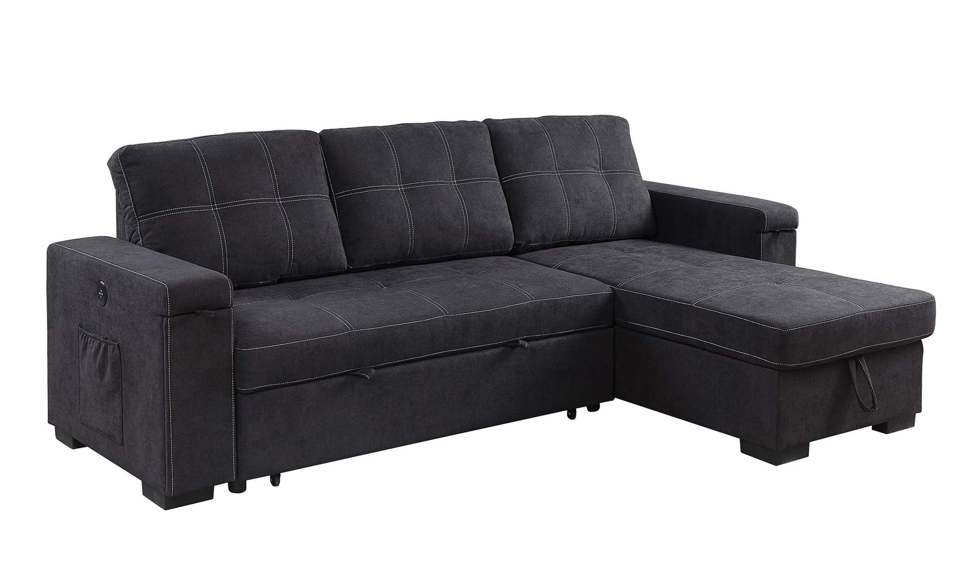 The Toby Woven Fabric Reversible Sleeper Sectional features dark gray upholstery, wide armrests, three back cushions, a right-side storage chaise, white stitching, a left arm pocket, cup holder, and built-in charging ports.