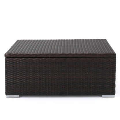 Santa Rosa - Storage Table: A rectangular outdoor coffee table featuring a dark brown woven rattan design, flat top, and short silver legs, shown against a plain white background.