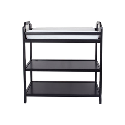 The Celeste - Changing Table is a black wooden unit with two open shelves and a white changing pad on top, displayed against a plain white background.