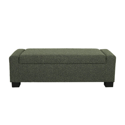 The Textured Fabric Ottoman Bench With Hinged Lid is rectangular, dark green, upholstered, and features short black legs. It’s shown from the front against a white background.