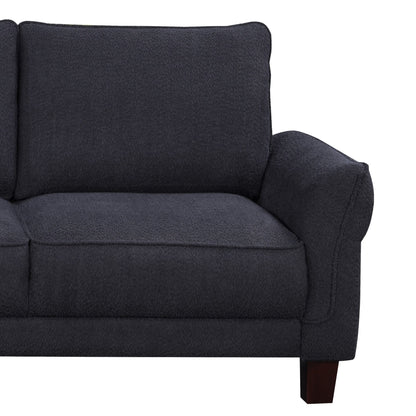 The Belle - Sherpa Sectional Sofa with Left Facing Chaise features dark gray upholstery, plush cushions, an armrest, and dark wooden legs, elegantly showcased from the left side.