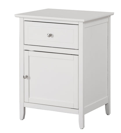 The Izzy - 1 Drawer / 1 Door Nightstand features a white wooden finish, single top drawer, lower cabinet door, and round metal knobs. Its simple, modern design is highlighted by clean lines.