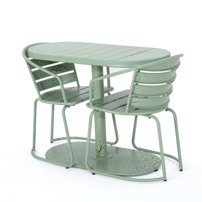 The 3 Piece Elegant Outdoor Bistro Set features a mint green, textured metal finish and includes two matching chairs that slide under the oval table for a compact, integrated look.