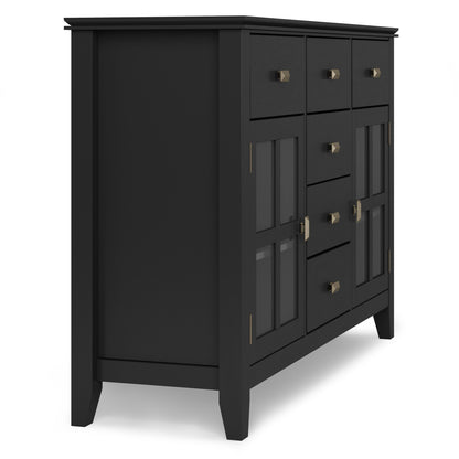 The Artisan - Handcrafted Sideboard Buffet is a black wooden piece with five central drawers, two glass-front cabinets, brass handles, and a modern minimalist design.