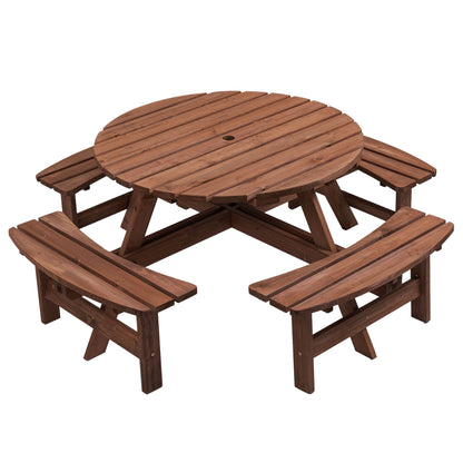 The 8 Person Wooden Picnic Table features a slatted top, central umbrella hole, and four built-in curved benches. Ideal for garden or outdoor dining, this table seats eight and supports up to 2220 lb.