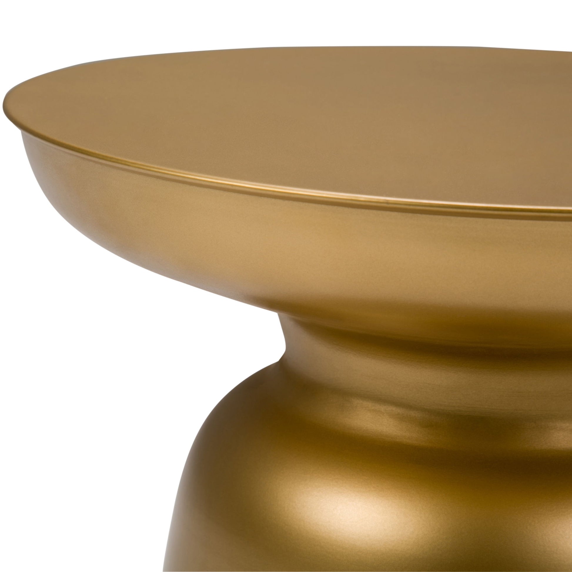 Close-up view of the Toby - Handcrafted Metal Accent Table featuring a smooth, rounded gold top and a sculpted, curvy base set against a white background.