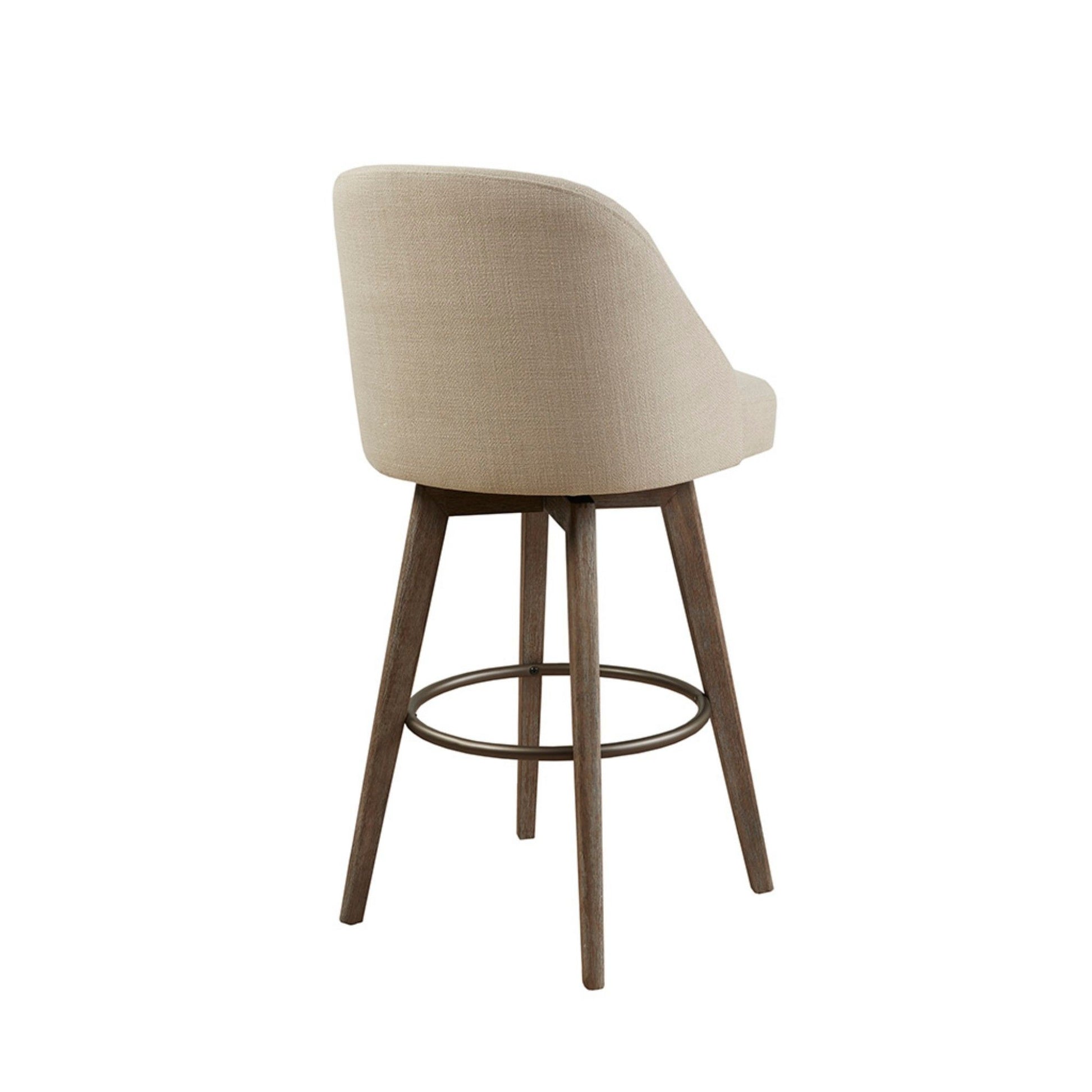 The Bar Stool With Swivel Seat - Sand features a beige upholstered seat, curved backrest, wooden legs, and a circular metal footrest, displayed from a rear three-quarter angle against a white background.