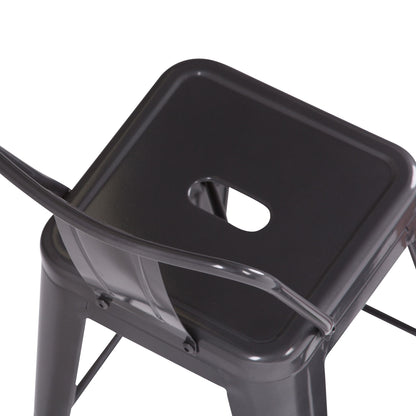 A close-up view of the Rayne - Curved Back Metal Stool (Set of 2), showcasing its black metal frame, square seat with a rounded rectangular cutout, and signature curved backrest.