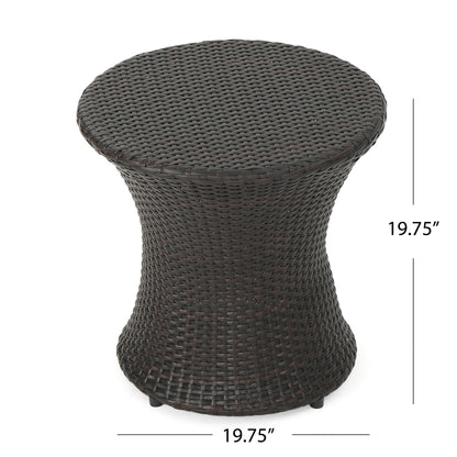 The Thrive Hourglass Rattan Table features a round, dark brown woven wicker design and measures 19.75" high by 19.75" in diameter. No glass top included.
