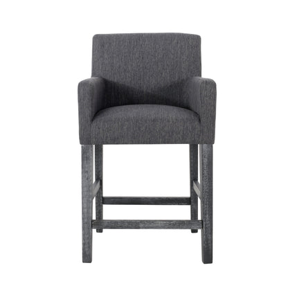 The Serenitia Upholstered Counter Chair features a dark gray seat, straight armrests, low backrest, and sturdy wooden frame with matching dark legs.