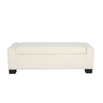 Textured Fabric Ottoman Bench With Hinged Lid in rectangular cream upholstery features a cushioned top and short black wooden legs, displayed against a white background.