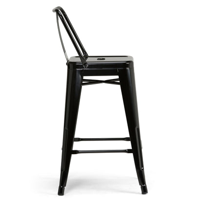 The Rayne - Multifunctional Metal Stool is a black metal bar stool with a slim backrest, four legs, and horizontal support bars. Viewed from the side on a white background, it features a minimalist industrial design.