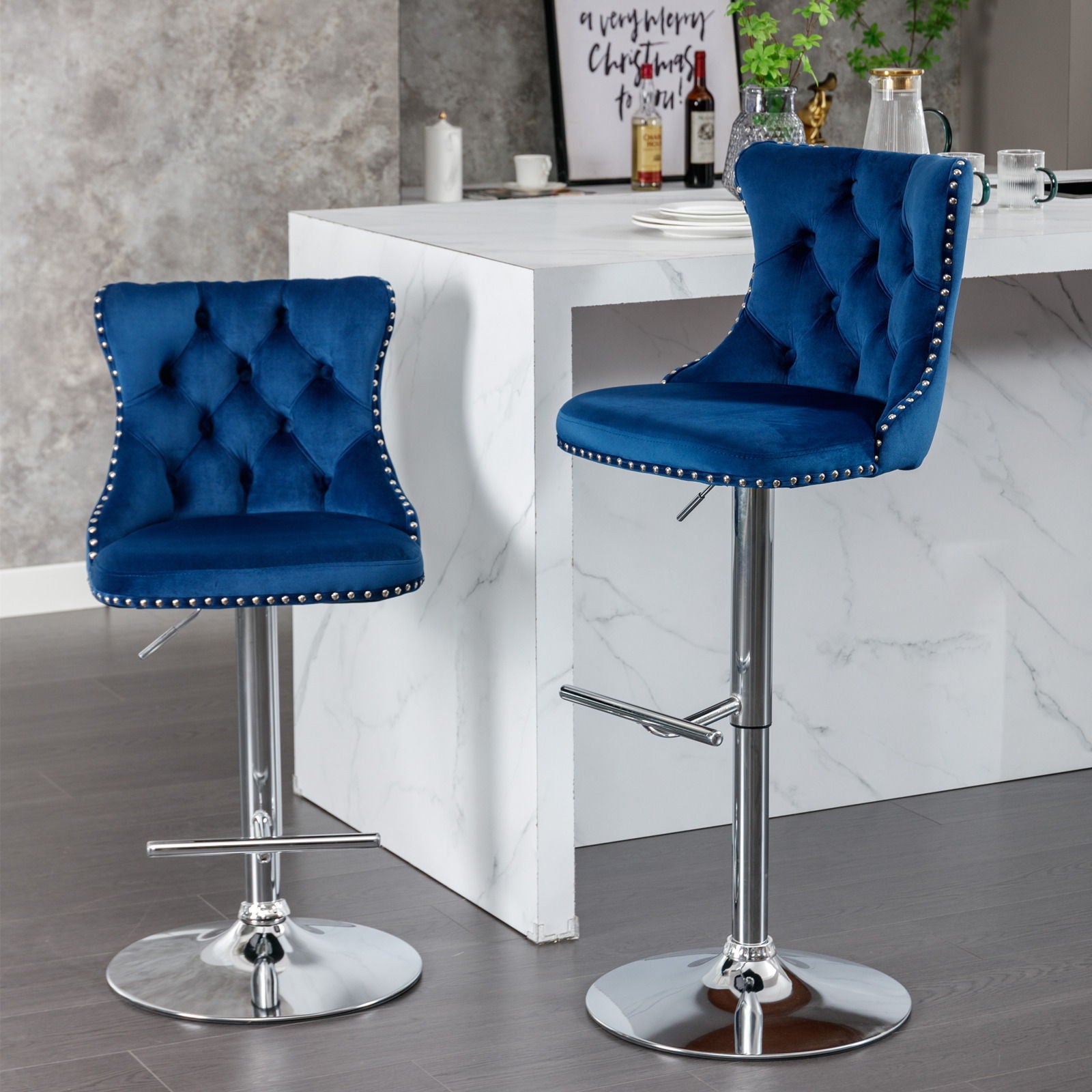 A set of two Swivel Velvet Barstools with adjustable seat height (25-33"), tufted backs, and chrome bases add a modern touch to a contemporary kitchen island.