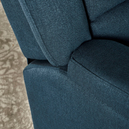 Close-up of the Contemporary Glider Recliner With Swivel Function, featuring blue fabric upholstery with visible texture on the armrest, seat, and backrest. A glimpse of a patterned beige carpet appears in the background.