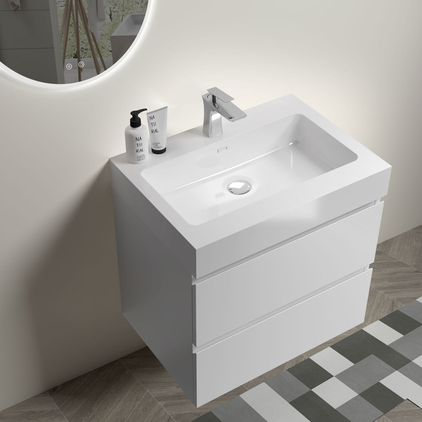 The Alice Bathroom Vanity features large storage and a sleek, one-piece sink basin (no drain or faucet included). This wall-mounted, modern white vanity is perfect for contemporary bathrooms with light walls and patterned tile floors.