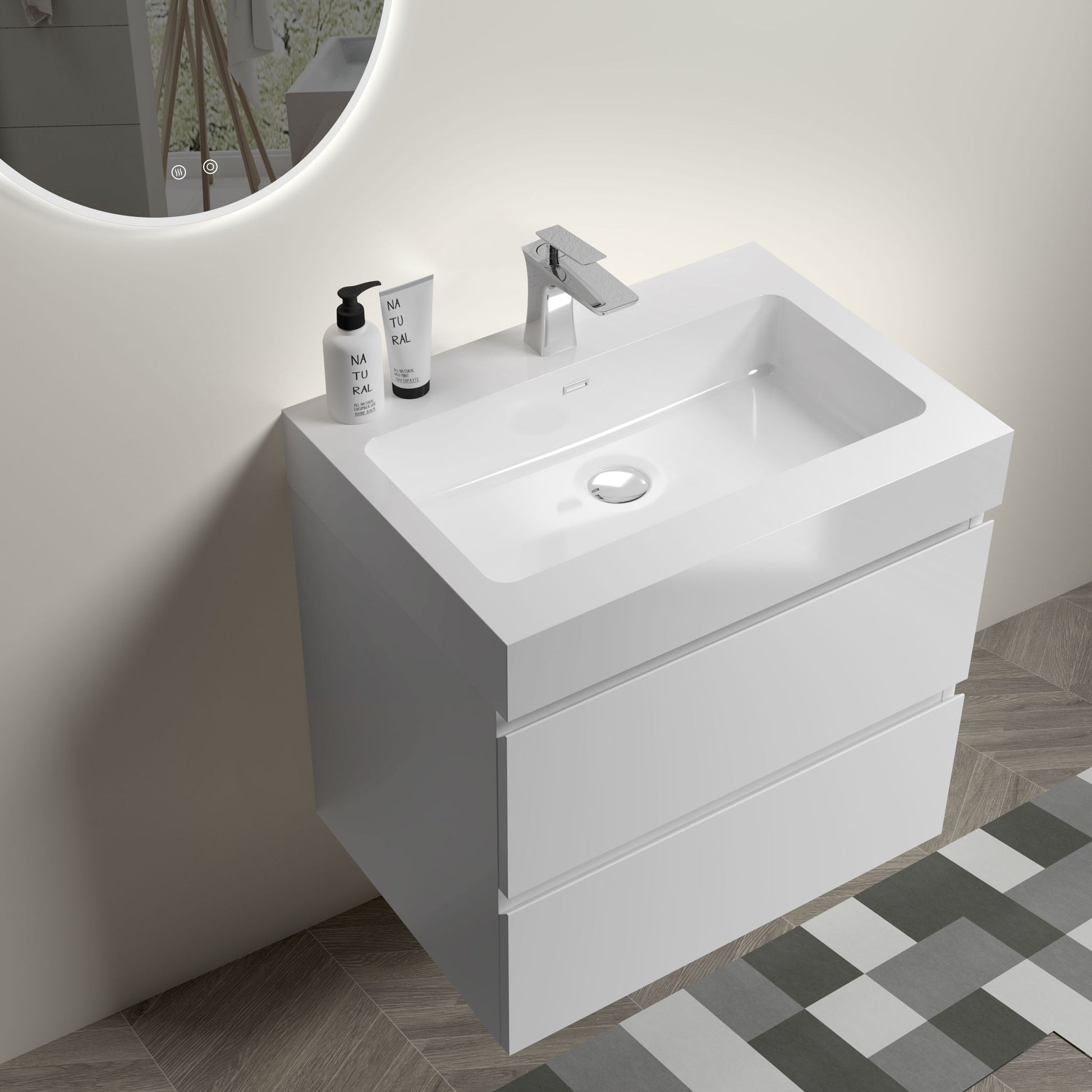 The Alice Bathroom Vanity features large storage and a sleek, one-piece sink basin (no drain or faucet included). This wall-mounted, modern white vanity is perfect for contemporary bathrooms with light walls and patterned tile floors.