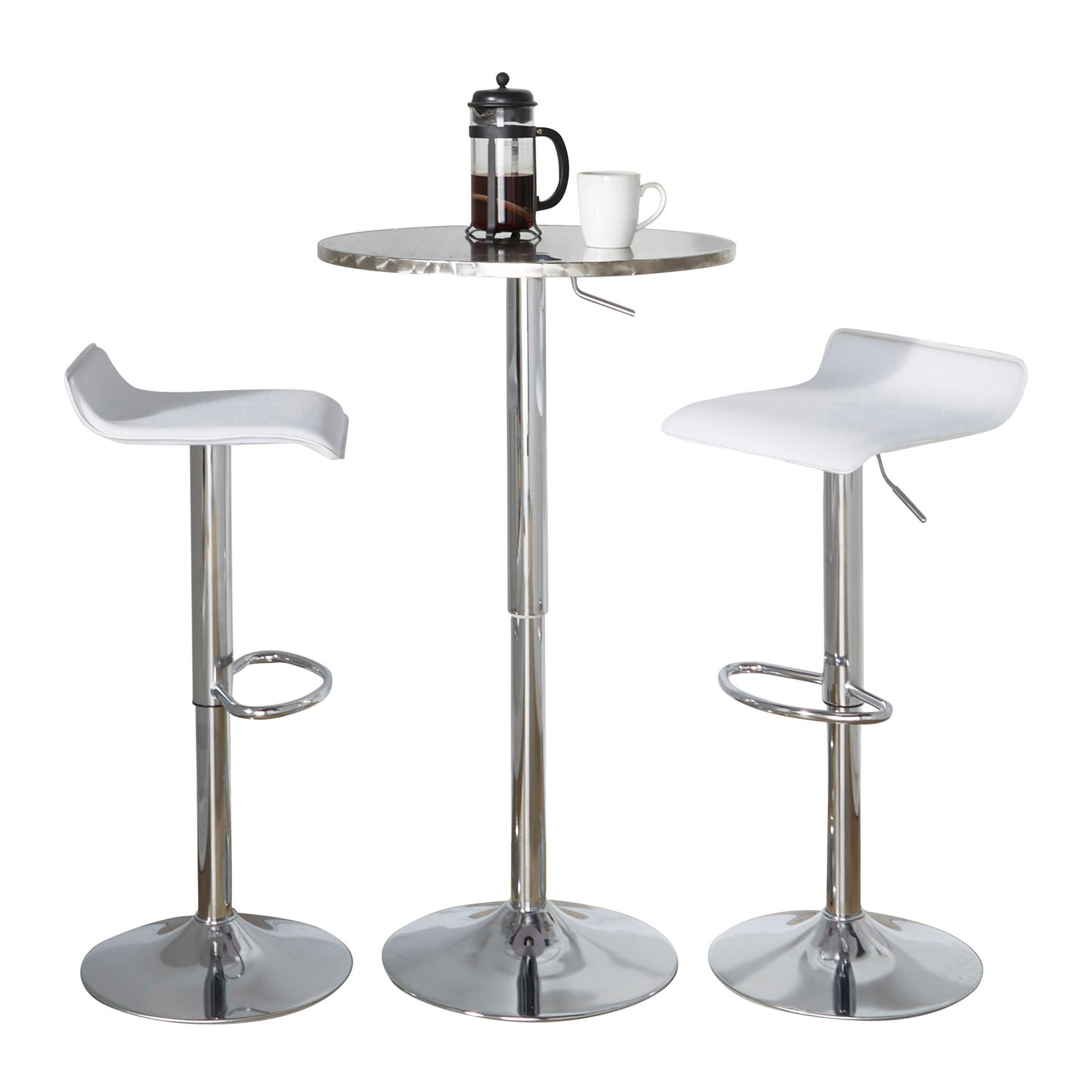 The Ale 3 Piece Bar Set features a contemporary round high-top table with two white bar stools with chrome bases and oval footrests. On the table are a French press coffee maker and a white mug.