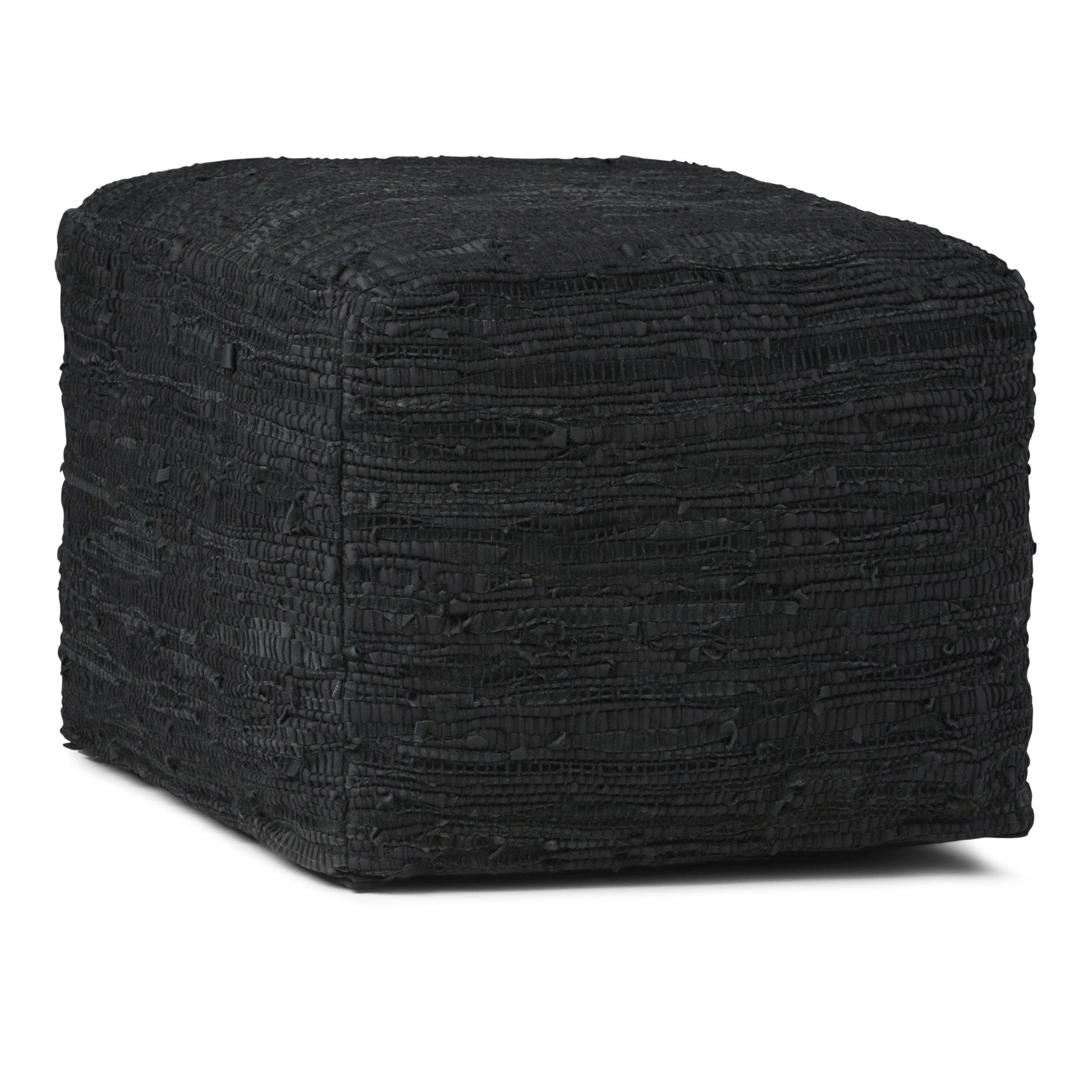 The Fredrik - Handcrafted Square Pouf is black, square-shaped with a textured surface and slightly rounded corners, displayed against a white background.